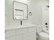 Modern bathroom with white vanity, quartz countertop, and black fixtures at 13717 S Huntington Rd, Arizona City, AZ 85123