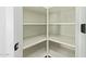 Spacious pantry with ample shelving for storage at 13717 S Huntington Rd, Arizona City, AZ 85123