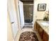 View of bathroom with shower and granite vanity at 143 W Michelle Dr, Phoenix, AZ 85023