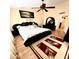 Main bedroom with wood floors and ceiling fan at 143 W Michelle Dr, Phoenix, AZ 85023