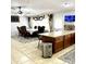 Bright dining room with a view of the kitchen and access to the backyard at 143 W Michelle Dr, Phoenix, AZ 85023