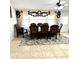 Dining area features a chandelier and large windows at 143 W Michelle Dr, Phoenix, AZ 85023