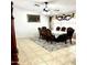 Formal dining room features a large table and matching chairs at 143 W Michelle Dr, Phoenix, AZ 85023