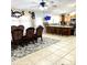 Open dining area with tile floors and kitchen access at 143 W Michelle Dr, Phoenix, AZ 85023