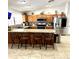 Kitchen boasts granite countertops, stainless steel appliances, and a breakfast bar at 143 W Michelle Dr, Phoenix, AZ 85023