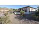 Landscaped backyard with gravel and desert plants at 17510 W Glenhaven Dr, Goodyear, AZ 85338