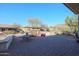 Spacious backyard with fire pit and seating area at 17510 W Glenhaven Dr, Goodyear, AZ 85338