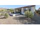 Landscaped backyard with gravel and desert plants at 17510 W Glenhaven Dr, Goodyear, AZ 85338