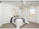 Charming bedroom with window seating and plenty of natural light at 18514 N 94Th St, Scottsdale, AZ 85255