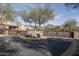 Gated community entrance with stone walls and mountain views at 18514 N 94Th St, Scottsdale, AZ 85255