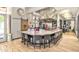 Open kitchen with modern appliances, large island, and barstool seating at 19777 N 76Th St # 3246, Scottsdale, AZ 85255