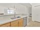 Open kitchen with stainless steel appliances and breakfast bar overlooking the living area at 19777 N 76Th St # 3246, Scottsdale, AZ 85255