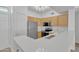 Well-lit kitchen features modern stainless-steel appliances and ample countertop space at 19777 N 76Th St # 3246, Scottsdale, AZ 85255