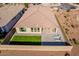 Aerial view of house, backyard, and community at 20121 W Lilac St, Buckeye, AZ 85326