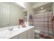 Clean bathroom with shower/tub combo, vanity, and updated fixtures at 20121 W Lilac St, Buckeye, AZ 85326