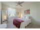 Bright bedroom with a queen-size bed at 20121 W Lilac St, Buckeye, AZ 85326