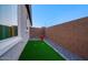 Private fenced dog run with artificial turf at 20121 W Lilac St, Buckeye, AZ 85326