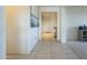 Bright and airy entryway with tile flooring and neutral color scheme at 20121 W Lilac St, Buckeye, AZ 85326