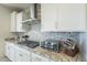 Kitchen with stainless steel appliances and granite countertops at 20121 W Lilac St, Buckeye, AZ 85326