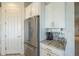 Kitchen with stainless steel refrigerator and coffee bar at 20121 W Lilac St, Buckeye, AZ 85326