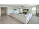 Open living room with sectional sofa and views to kitchen at 20121 W Lilac St, Buckeye, AZ 85326
