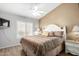 Bright and airy bedroom with king-size bed and ample space at 23166 W Shadow Dr, Buckeye, AZ 85326