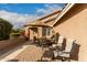 Outdoor patio with seating and umbrella, great for relaxation at 23166 W Shadow Dr, Buckeye, AZ 85326