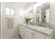 Bathroom with double vanity and marble countertop at 2918 E Des Moines St, Mesa, AZ 85213