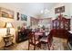 Elegant dining room with a large table and hardwood floors at 2946 N 110Th Dr, Avondale, AZ 85392