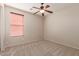 Bright bedroom featuring carpeted floor and window blinds at 30449 N Gunderson Dr, San Tan Valley, AZ 85143