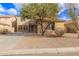 Two-story house with stone accents and a driveway at 30449 N Gunderson Dr, San Tan Valley, AZ 85143