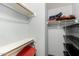 Closet with shelving and hanging rods at 3301 S Goldfield Rd # 2068, Apache Junction, AZ 85119