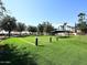 Landscaped community park with a covered pavilion at 3301 S Goldfield Rd # 2068, Apache Junction, AZ 85119