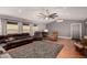Spacious living room featuring hardwood floors and a ceiling fan at 3301 S Goldfield Rd # 2068, Apache Junction, AZ 85119