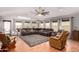 Spacious living room with hardwood floors and a cozy seating area at 3301 S Goldfield Rd # 2068, Apache Junction, AZ 85119