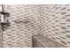 Shower with gray mosaic tile and built-in bench seat at 3301 S Goldfield Rd # 2068, Apache Junction, AZ 85119