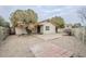 Spacious backyard includes a patio and low-maintenance landscaping for outdoor enjoyment at 4453 W Keating Cir, Glendale, AZ 85308