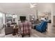 Open living room with gray sofas and a neutral color palette at 474 E Jasper Dr, Gilbert, AZ 85296