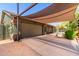 Exterior showcasing a covered carport with ample parking and desert landscaping for low maintenance at 548 N 82Nd St, Mesa, AZ 85207