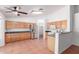 Bright kitchen featuring stainless steel appliances, plenty of cabinets, and a breakfast bar at 548 N 82Nd St, Mesa, AZ 85207