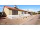 Charming backyard with a white picket fence at 6877 S Oakmont Dr, Chandler, AZ 85249