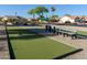 This community features bocce ball courts, benches and common area for social gatherings and recreation at 6877 S Oakmont Dr, Chandler, AZ 85249
