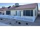 Tan house exterior with white picket fence at 6877 S Oakmont Dr, Chandler, AZ 85249