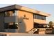 Exterior daytime shot of the SunBird building, featuring a sign and stairs to the entrance at 6877 S Oakmont Dr, Chandler, AZ 85249