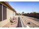 Small patio area with two rocking chairs at 6877 S Oakmont Dr, Chandler, AZ 85249