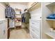 Large walk-in closet with ample shelving and drawers at 6877 S Oakmont Dr, Chandler, AZ 85249