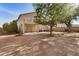 Spacious backyard with large patio and mature trees at 6962 W Glenn Dr, Glendale, AZ 85303