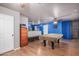 Game room featuring a pool table, built-in shelving, and ample space at 6962 W Glenn Dr, Glendale, AZ 85303