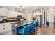 Kitchen features granite countertops, stainless steel appliances, and an island at 6962 W Glenn Dr, Glendale, AZ 85303