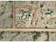 Aerial view of a property with multiple structures on a large lot at 735 S Ruby Rd, Maricopa, AZ 85139